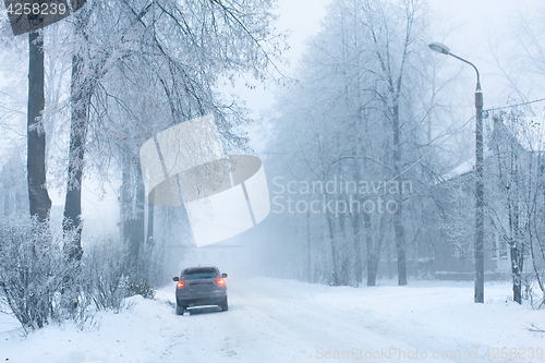 Image of car on the snowy street