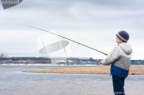 Image of boy on the fishing