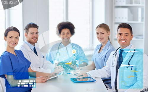 Image of group of happy doctors meeting at hospital office