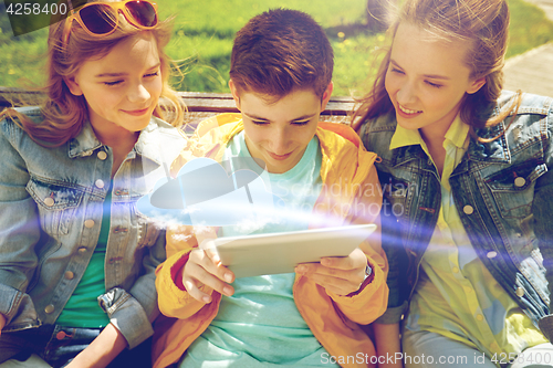 Image of students or friends with tablet pc outdoors