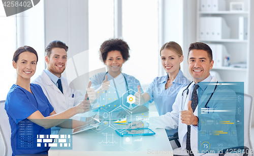 Image of group of happy doctors meeting at hospital office