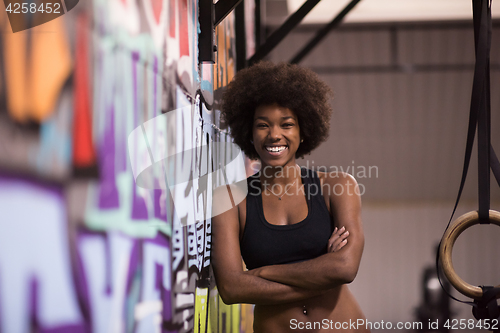 Image of portrait of black women after workout dipping exercise