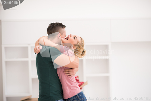 Image of happy Young couple moving in new house