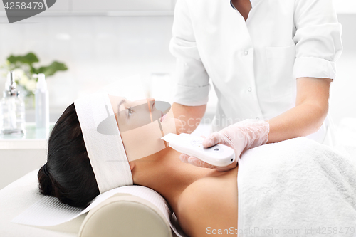 Image of The woman&#39;s face during a facial at a beauty salon