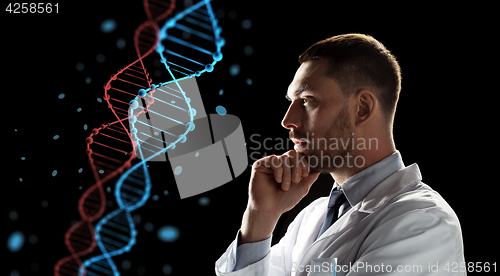 Image of doctor or scientist looking at dna molecule