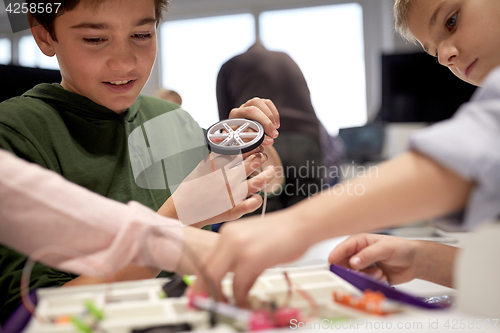 Image of children with building kit at robotics school