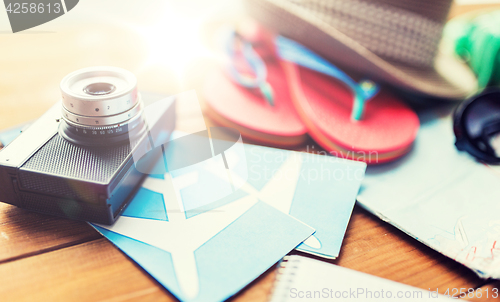 Image of close up of camera, tickets and travel stuff