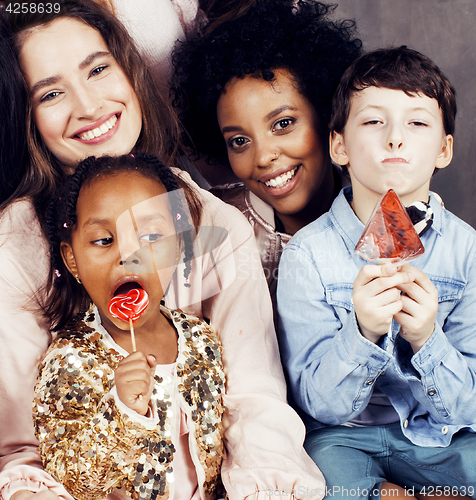 Image of Lifestyle and people concept: young pretty diversity nations woman with different age children celebrating on birth day party together happy smiling, making selfie. African-american, asian and caucasi