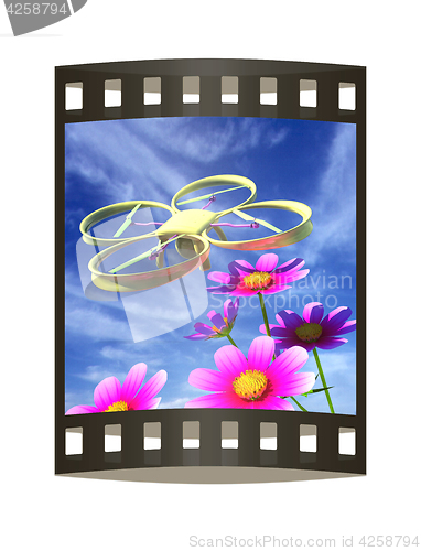 Image of Drone, quadrocopter, with photo camera against the sky and Beaut