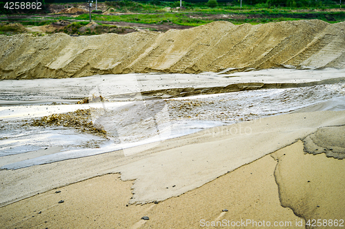 Image of Extraction of sand, sand pit with water