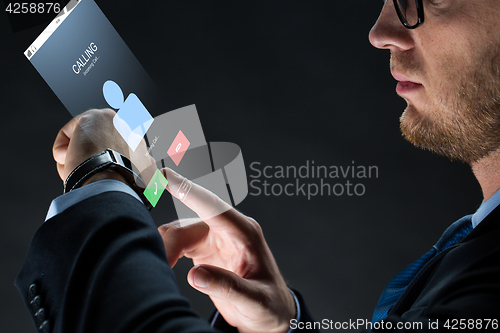 Image of close up of businessman with smartwatch