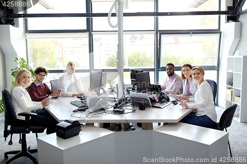Image of business team with computers working at office