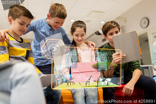 Image of happy children with tablet pc and virtual animals