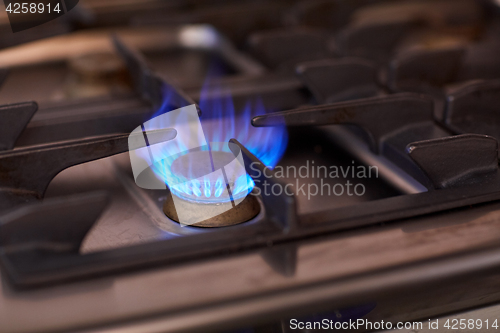 Image of burning gas stove flame