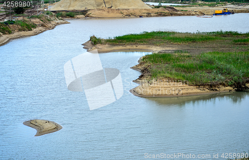 Image of Extraction of sand, sand pit with water