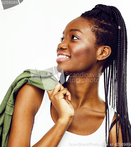 Image of young pretty african-american girl posing cheerful emotional on white background isolated, lifestyle people concept 