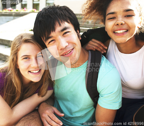 Image of portrait of international group of students close up smiling, bl