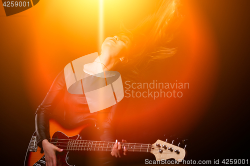 Image of Woman in light of soffits