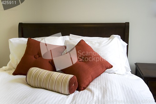 Image of Close up on a bed in a bedroom