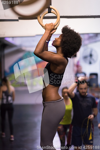 Image of black woman doing dipping exercise