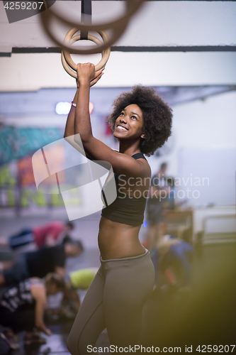 Image of black woman doing dipping exercise