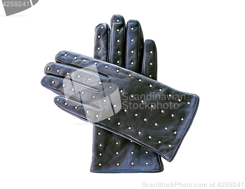 Image of Black leather gloves with metal rivets isolated on white backgro