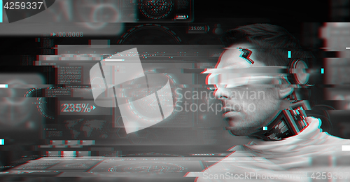 Image of man with futuristic glasses and sensors