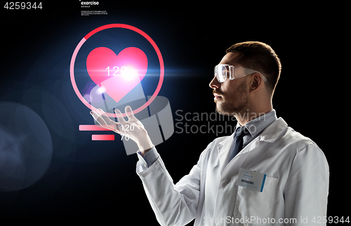 Image of doctor or scientist with heart rate projection