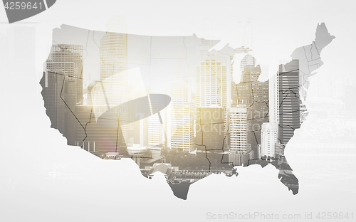 Image of map of united states of america over city