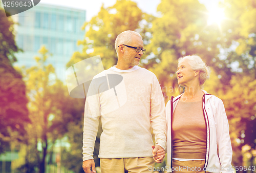 Image of senior couple in city park