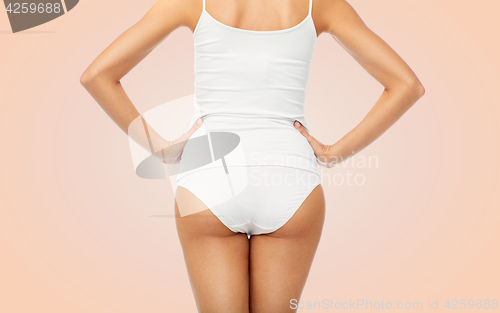 Image of close up of woman body in white underwear