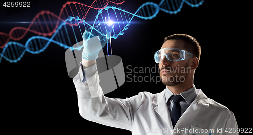 Image of scientist with test tube and dna molecule