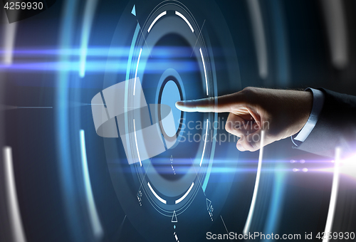 Image of male hand pointing finger to virtual projection