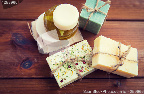 Image of close up of handmade soap bars on wood