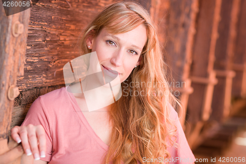 Image of Outdoor Portrait of Young Adult Brown Eyed Woman.