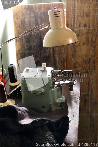 Image of Sewing machine. Sewing machine in a tailor shop. 