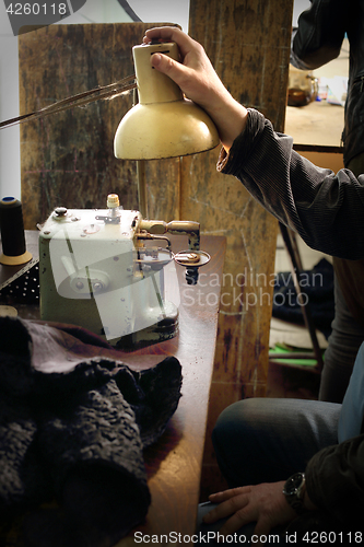 Image of Sewing machine. Sewing machine in a tailor shop. 