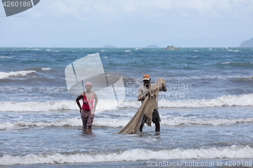 Image of Native Malagasy fishermen fishing on sea, Madagascar