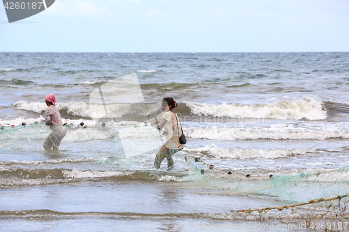 Image of Native Malagasy fishermen fishing on sea, Madagascar