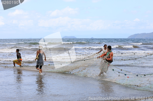 Image of Native Malagasy fishermen fishing on sea, Madagascar