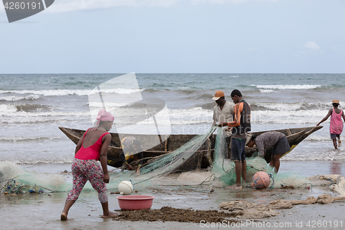 Image of Native Malagasy fishermen fishing on sea, Madagascar