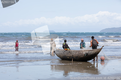 Image of Native Malagasy fishermen fishing on sea, Madagascar