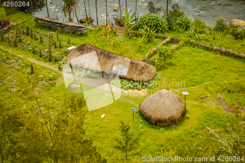 Image of Two houses in Trikora