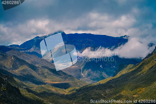 Image of High mountains in fog