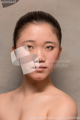 Image of The face of ballet dancer on studio background