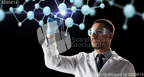 Image of scientist with test tube and molecule projection