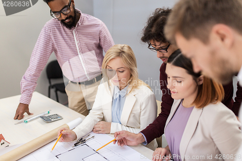 Image of business team discussing house project at office