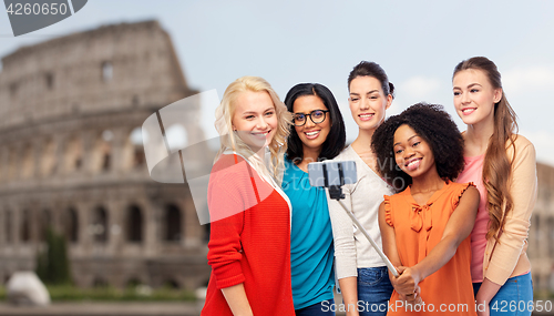 Image of international women taking selfie over coliseum