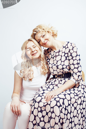 Image of mother with daughter together posing happy smiling isolated on white background with copyspace, lifestyle people concept closeup