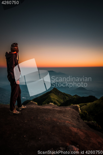 Image of Hiker looking at mountains